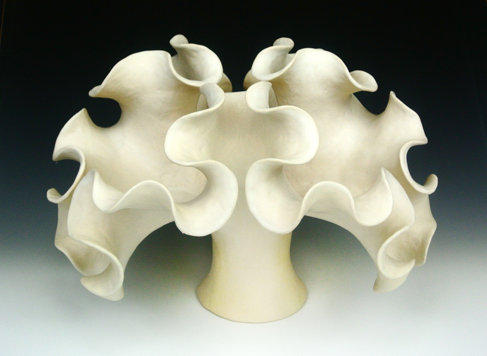 Organic-looking ceramic sculpture based on a the Sierpinski Arrowhead fractal curve, first view.